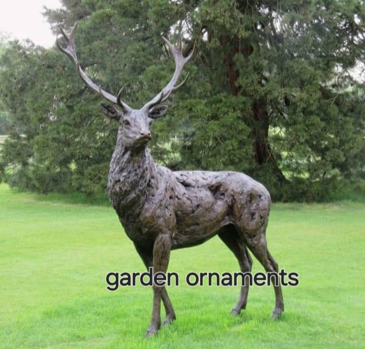 Stag garden ornament statue on a lawn