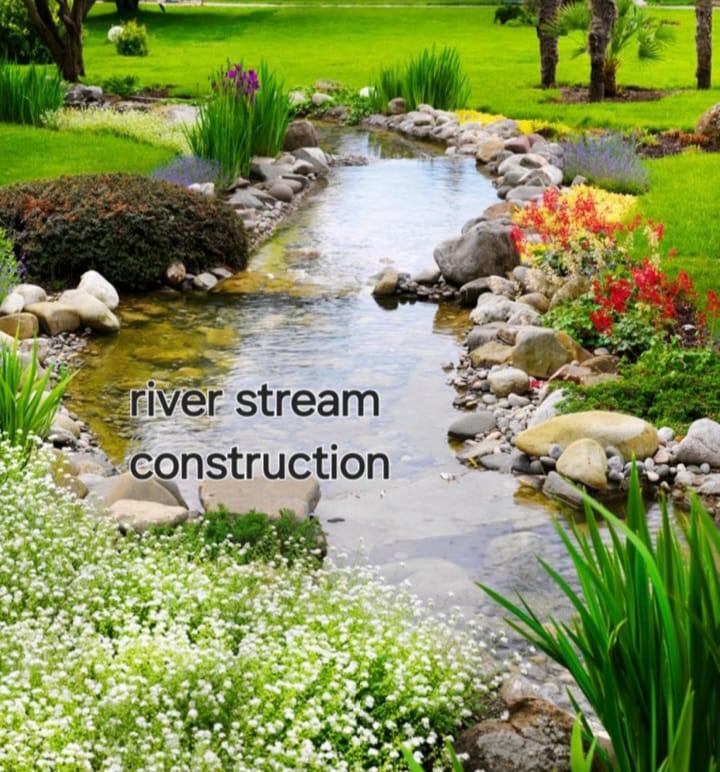 River stream construction with rockery and flowers